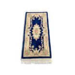 CHINESE STYLE BLUE AND CREAM RUG