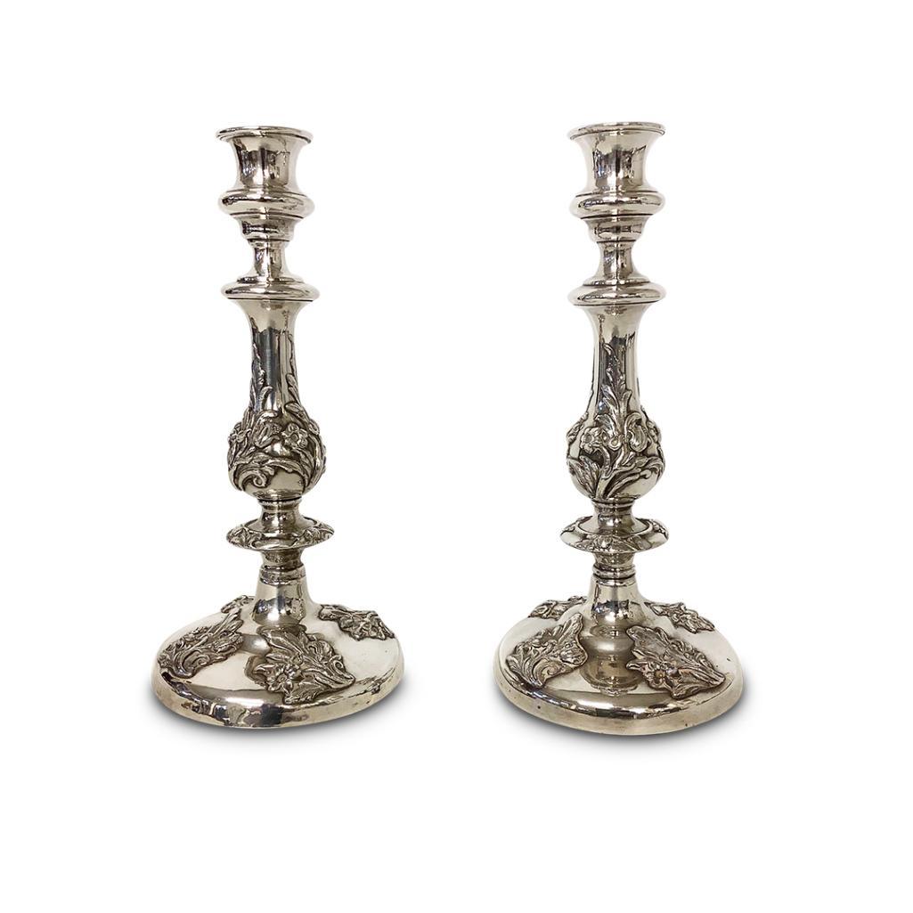 PAIR OF 19TH CENTURY WHITE METAL CANDLESTICKS