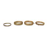 FOUR 9CT GOLD METAL CORE BANGLES