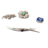 SILVER PURPLE STONE BROOCH AND THREE OTHERS