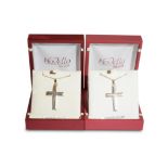 TWO SILVER CRUCIFIX PENDANTS ON CHAINS