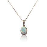 9CT GOLD AND OPAL PENDANT ON CHAIN