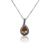 9CT WHITE GOLD AND YELLOW TOPAZ PENDANT ON CHAIN