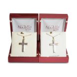 TWO SILVER CRUCIFIX PENDANTS ON CHAINS