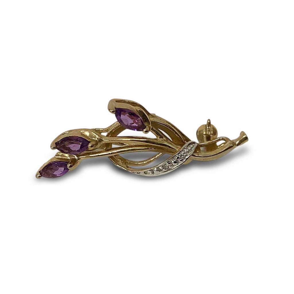 9CT GOLD DIAMOND AND AMETHYST BROOCH