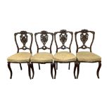 SET OF FOUR VICTORIAN CARVED MAHOGANY SIDE CHAIRS