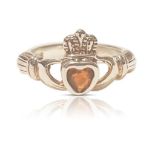 SILVER AND GARNET CLADDAGH RING