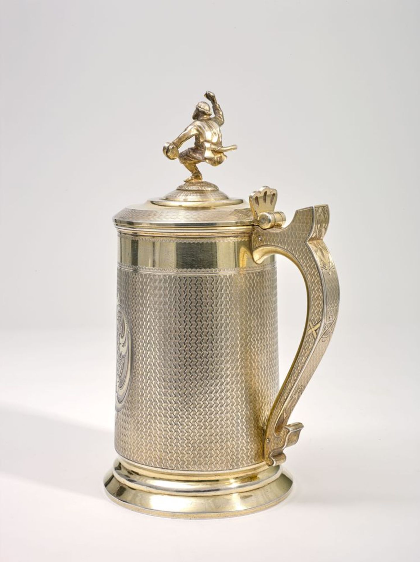 Silver-gilt tankard with a lid with a dancing peasant finial. Russia, Saint [...]