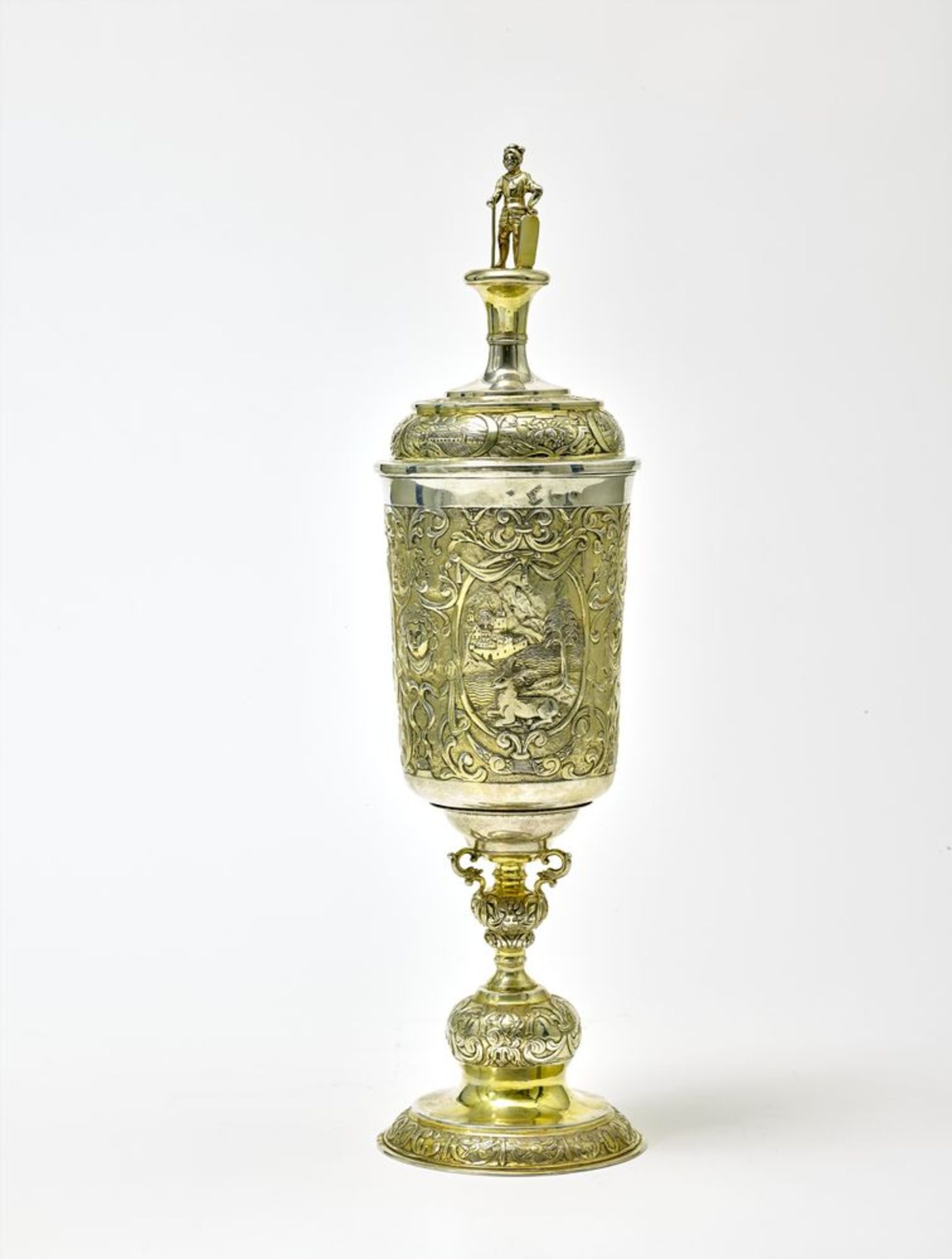 Silver-gilt chalice with a lid in Neoclassical style, with a finial featuring figure [...]