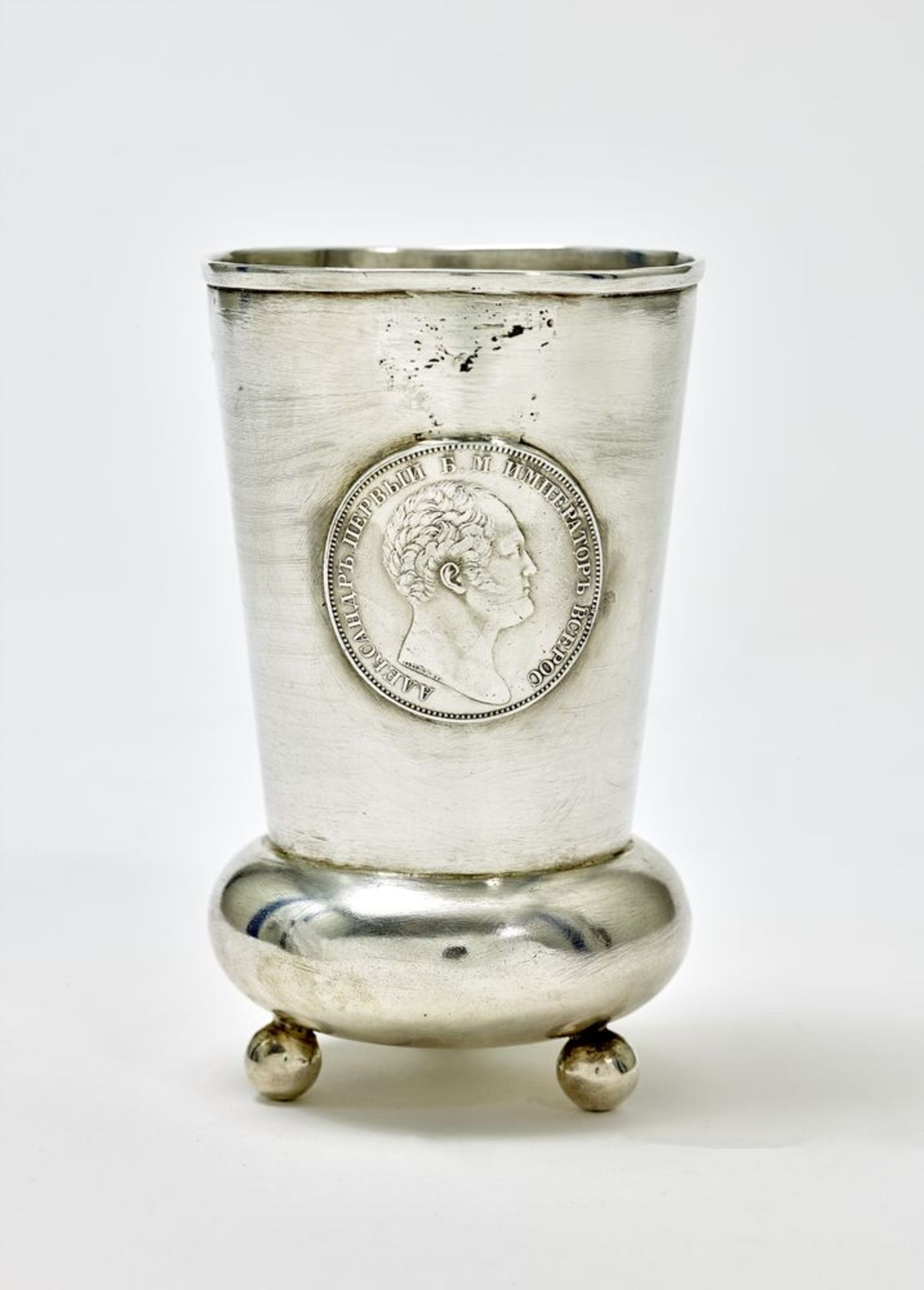 Silver-gilt goblet decorated with a Russian commemorative ruble coin featuring a [...]