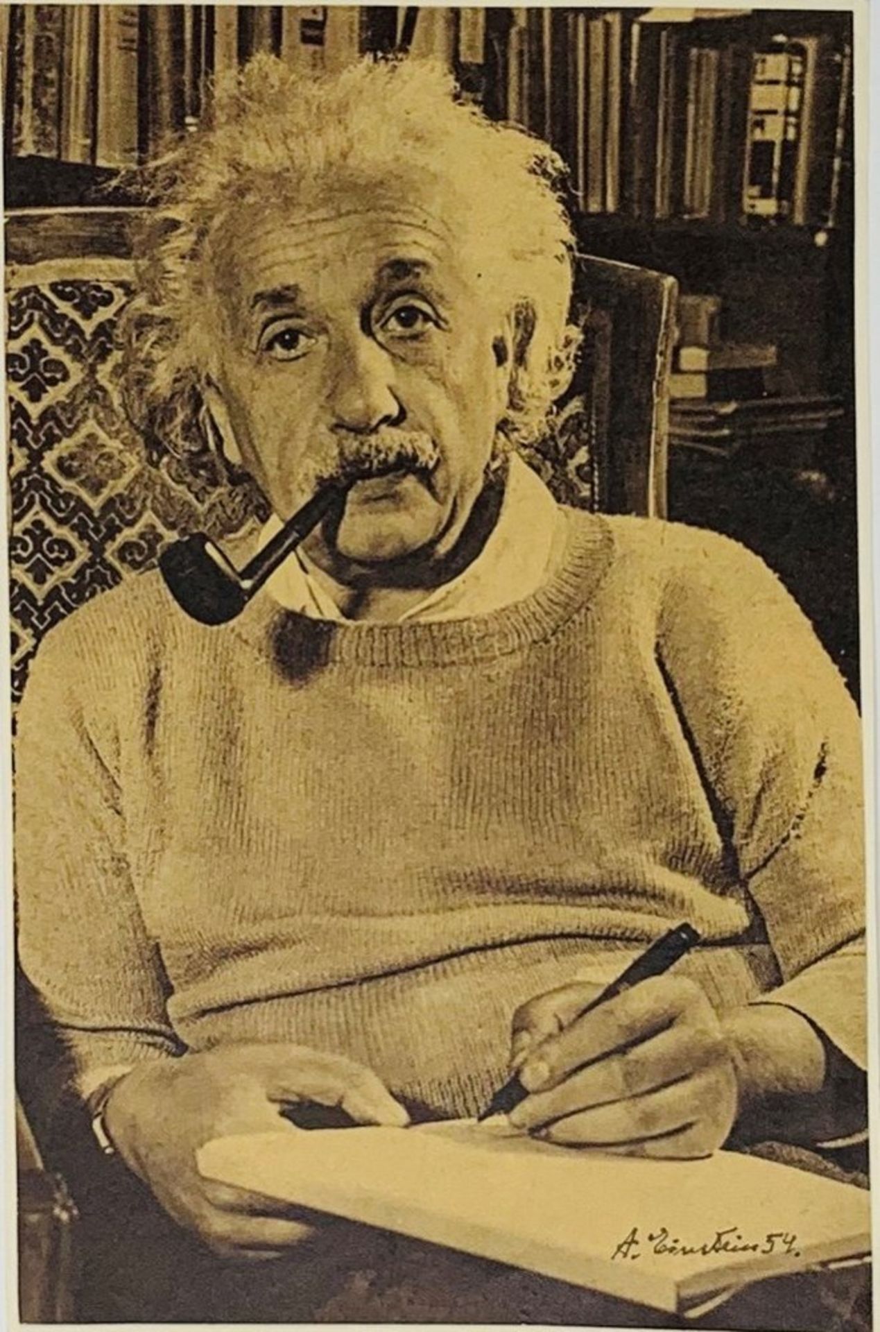 EINSTEIN ALBERT. 1879-1955. Portrait with autograph. - Magazine cutout, signed and [...]