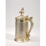 SILVER-GILT TANKARD WITH A LID WITH A DANCING PEASANT FINIAL., SILVER-GILT TANKARD [...]