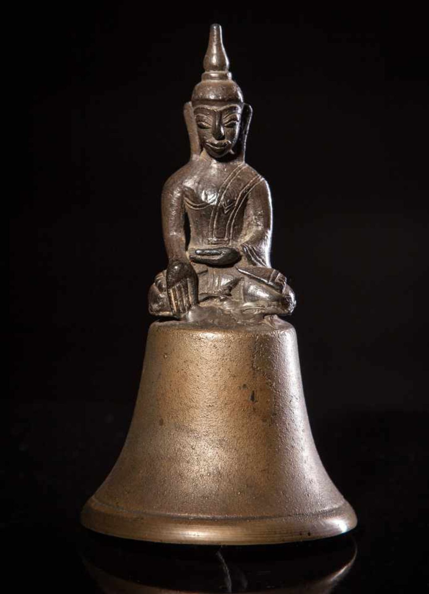 A Bronze and Silver Alloy Figure of Buddha
