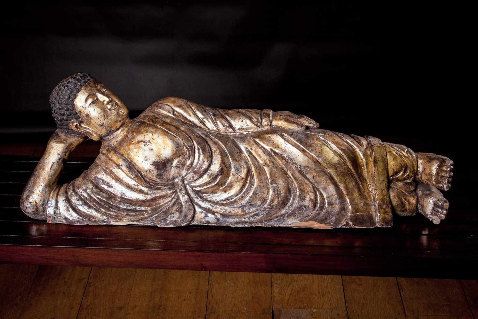 A Very Large Gilt Wood Figure of Buddha