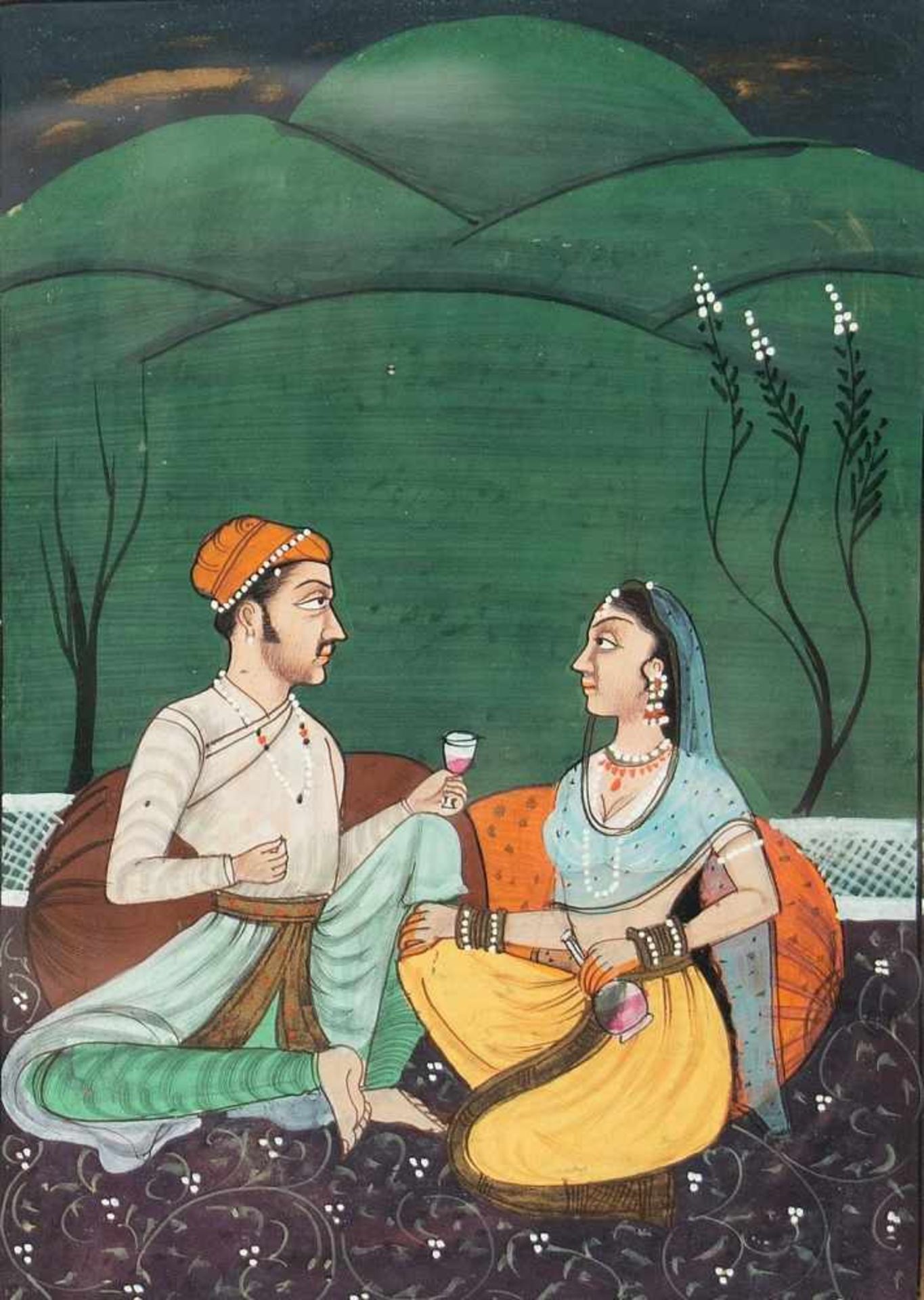 A prince and princess seated on a terrace