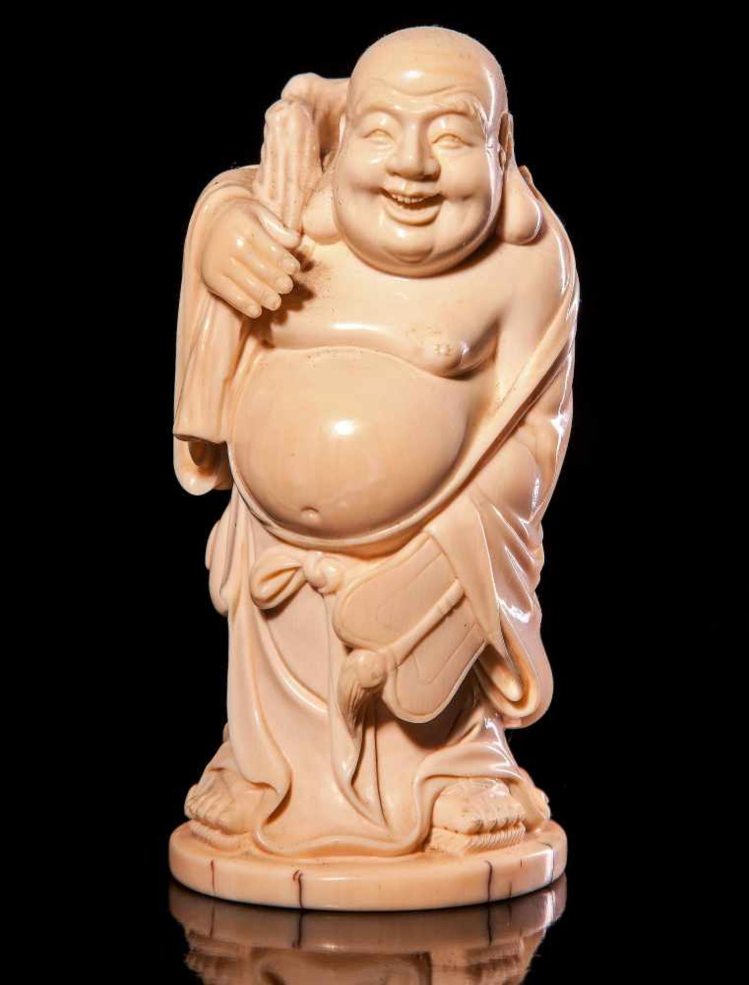 A Finely Carved Figure of Budai