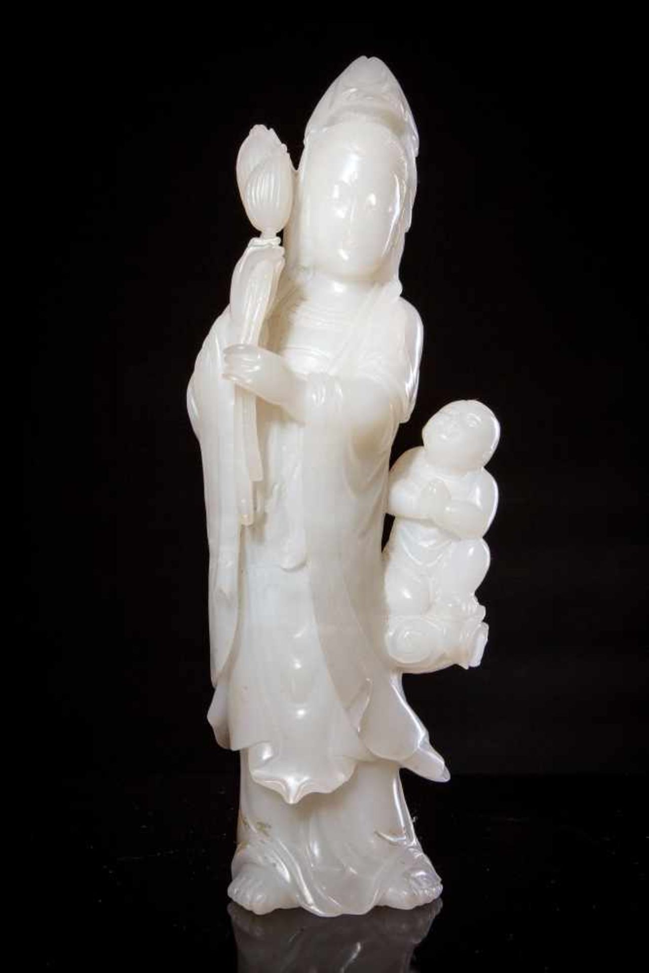 A White Jade Figure of Guanyin and Shancai