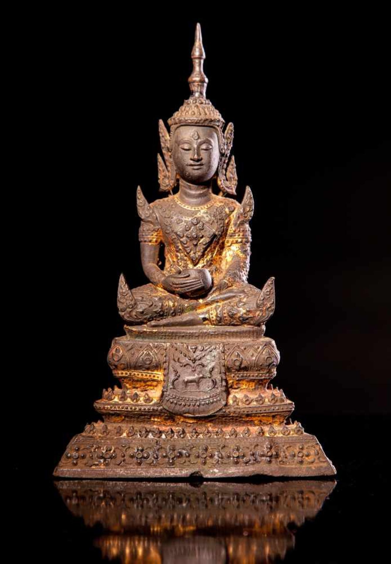 A Gilt Bronze Seated Buddha Thailand