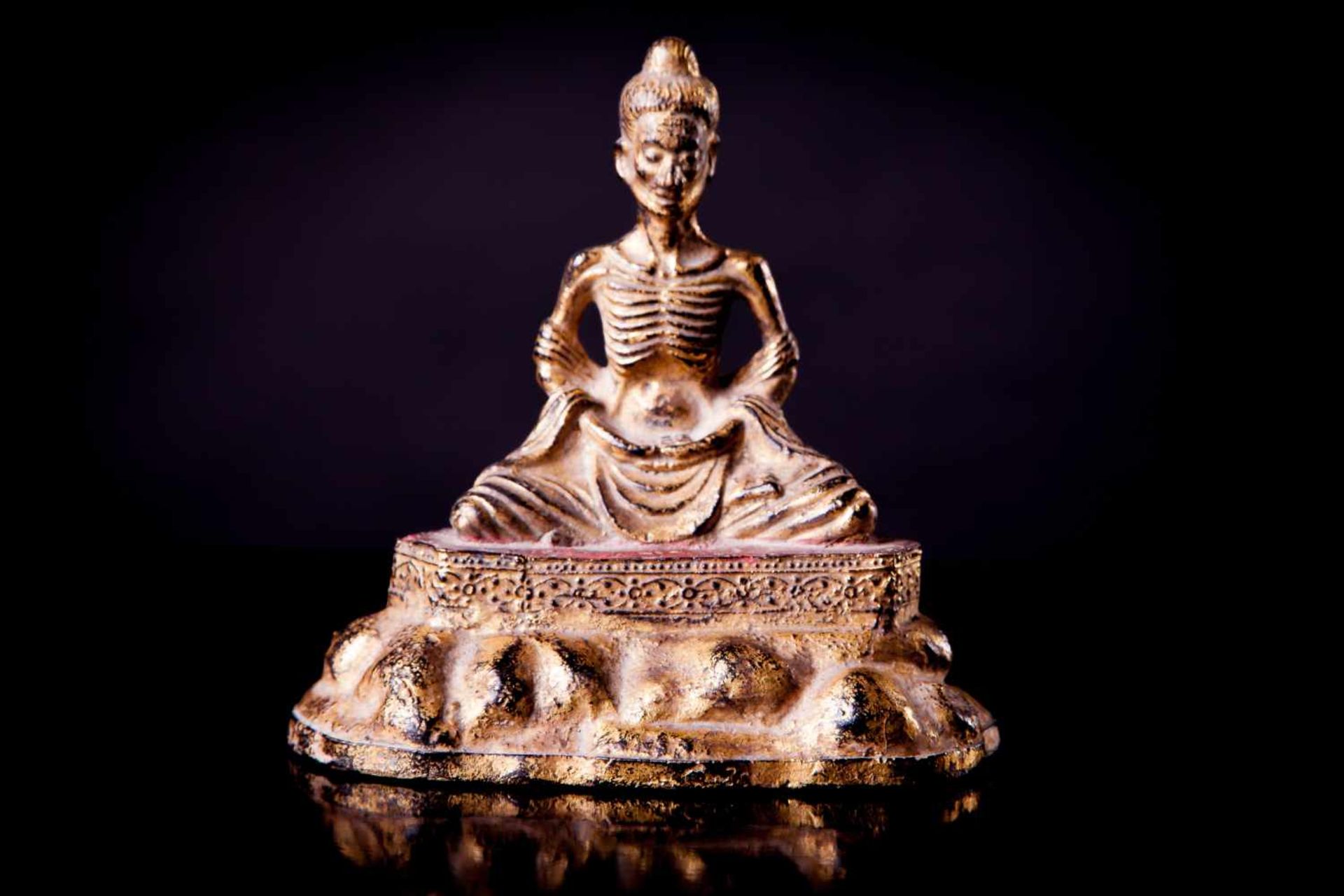 A Rare Bronze Figure of an Emaciated Buddha
