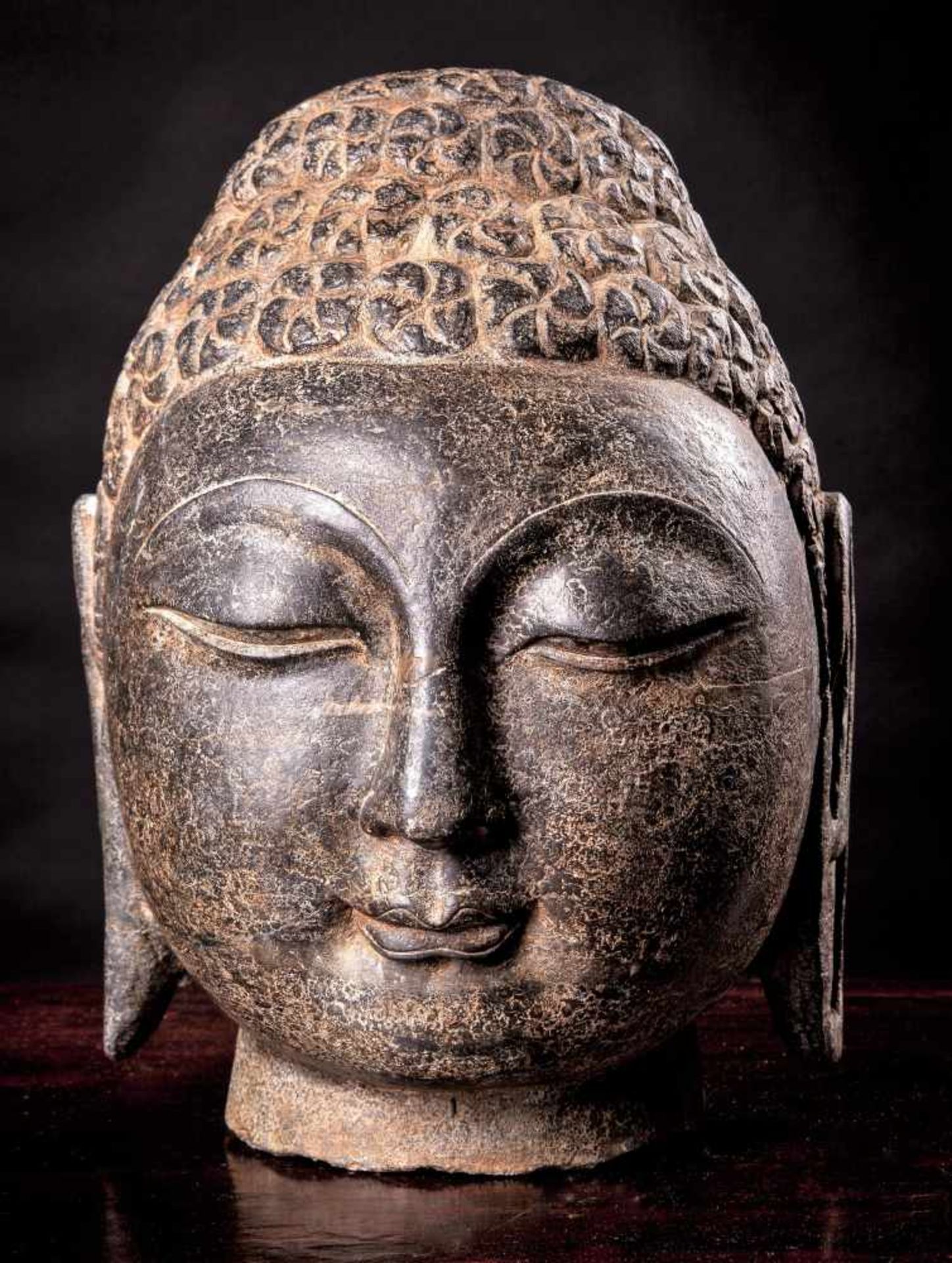 A Chinese Carved Stone Head of Buddha