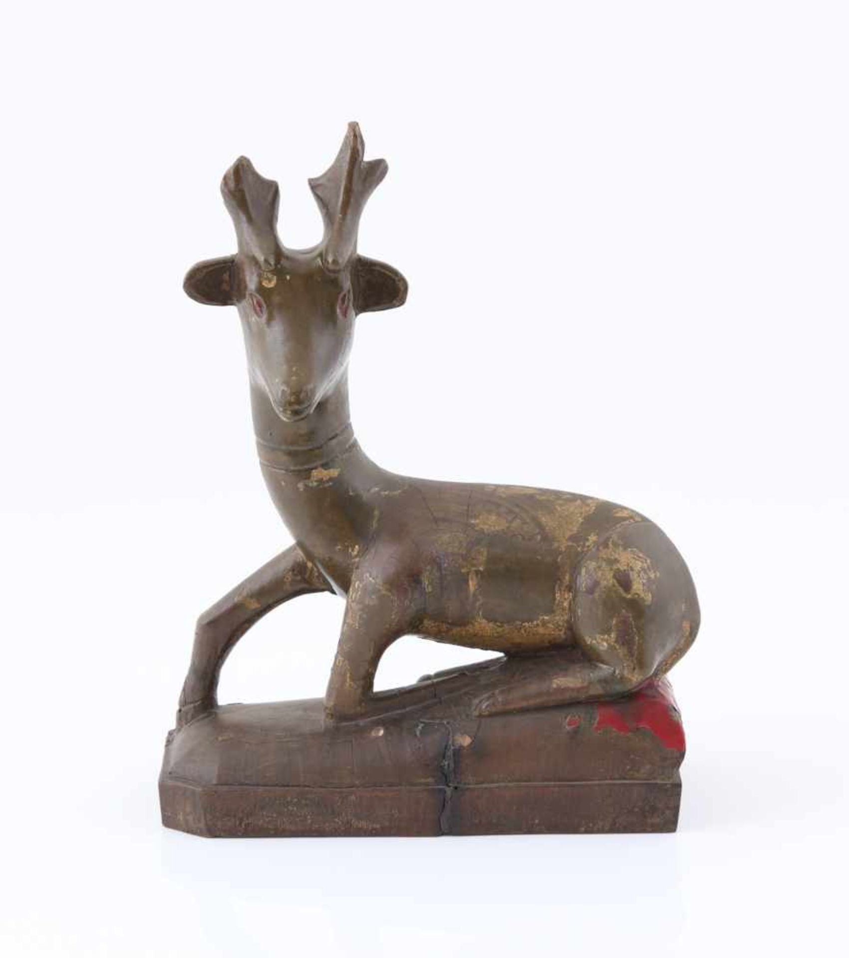 A Lacquered Wood Carving of a Deer