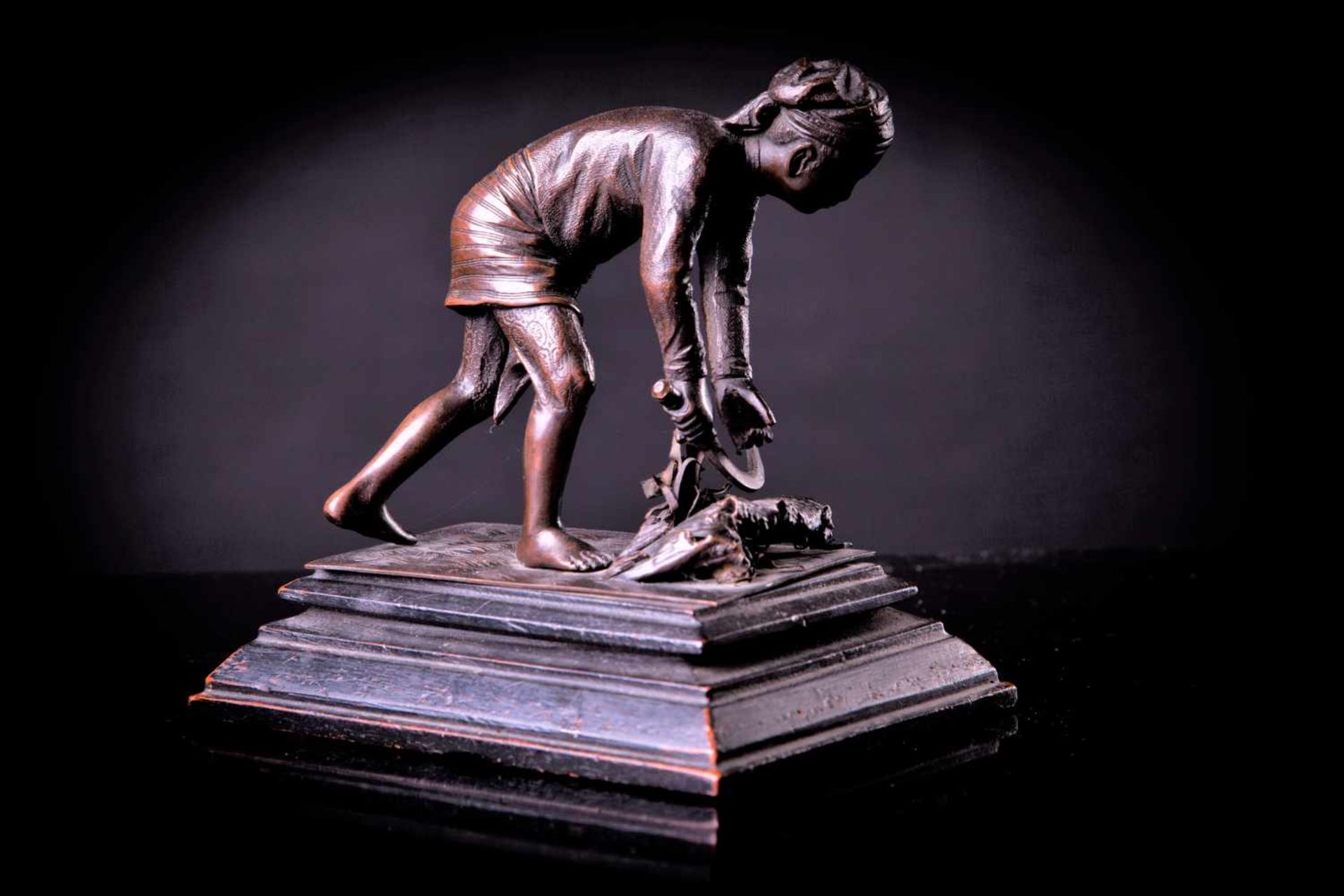 A Bronze Figure of a Farmer