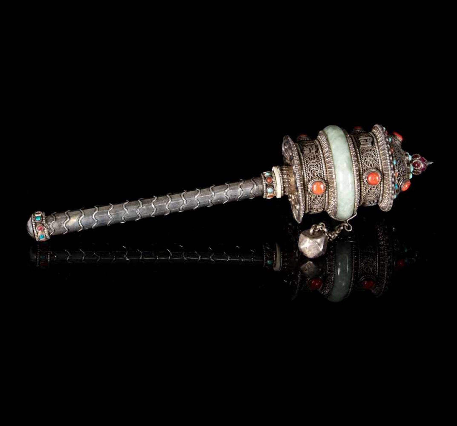 A silver prayer wheel