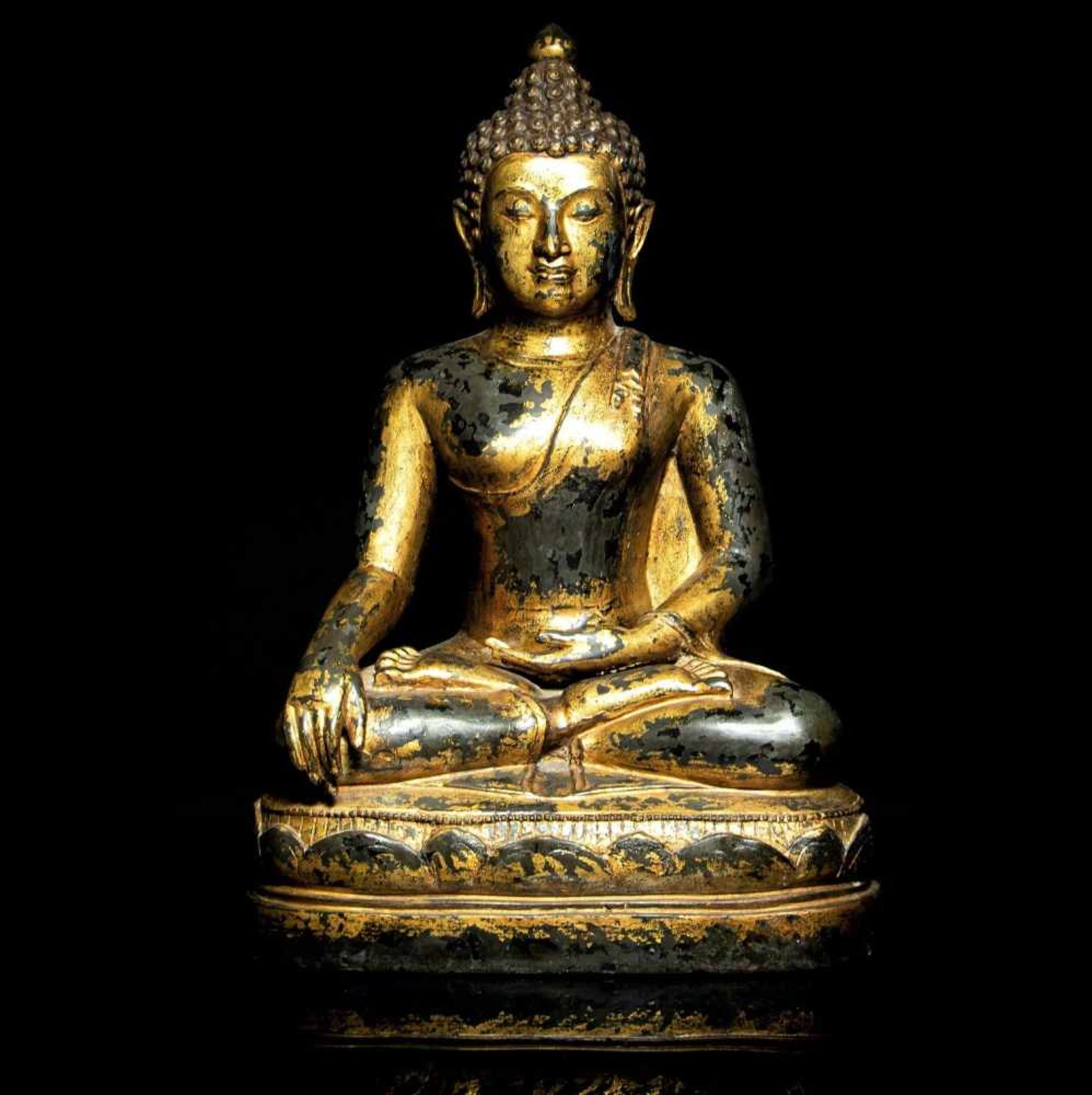 A very large gilt-bronze seated figure of Buddha