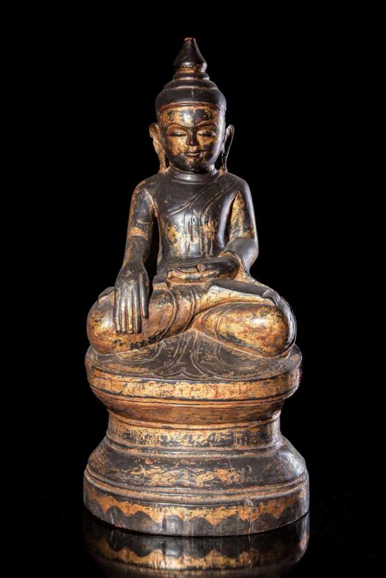 A Gilt Wood Seated Buddha