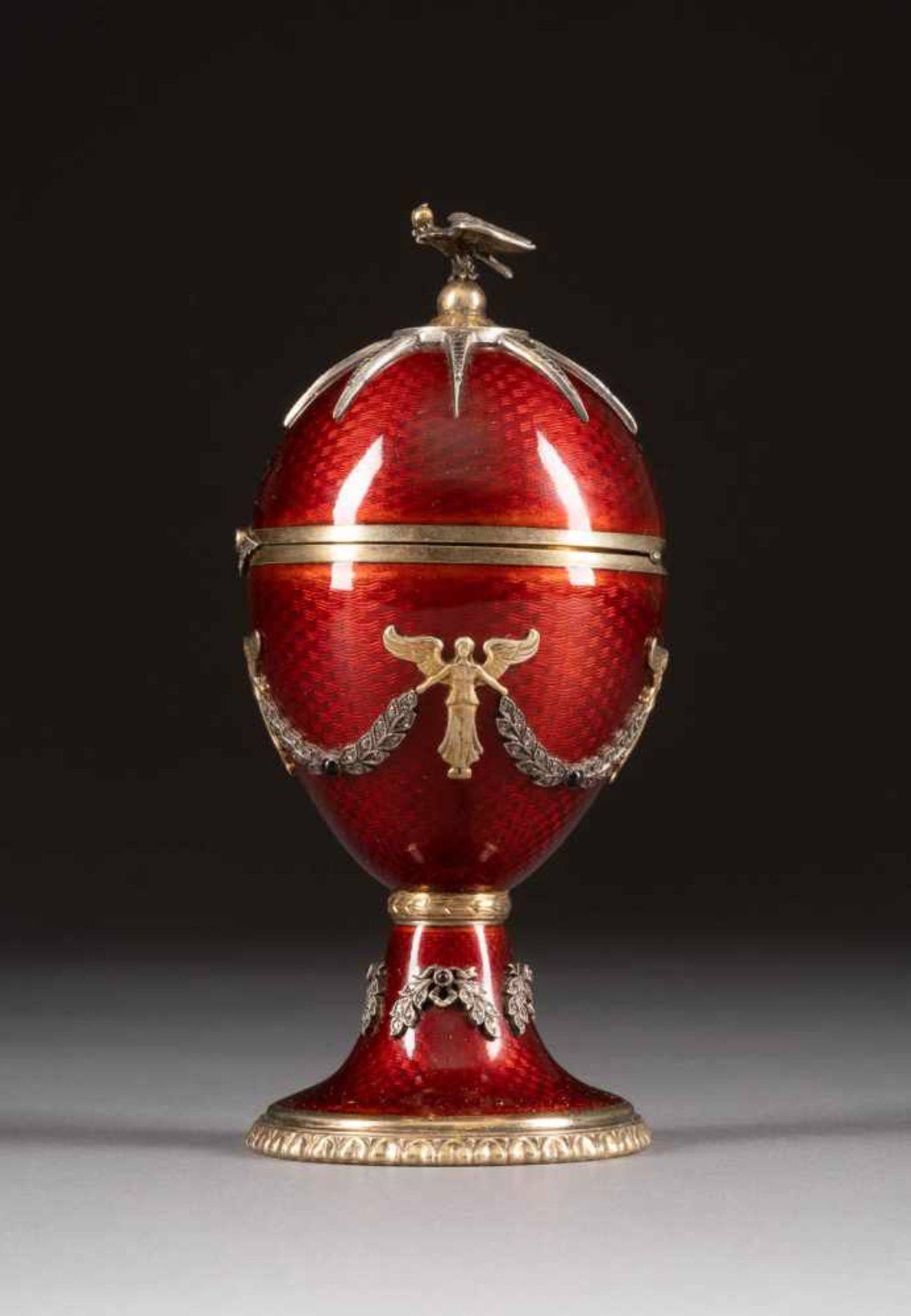 A SILVER-GILT AND GUILLOCHÉ ENAMEL EGG SHAPED BOX<