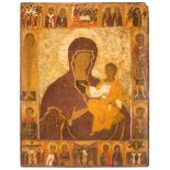 A MONUMENTAL ICON SHOWING THE MOTHER OF GOD, MAIN LITURGICAL FEASTS AND SELECTED SAINTS