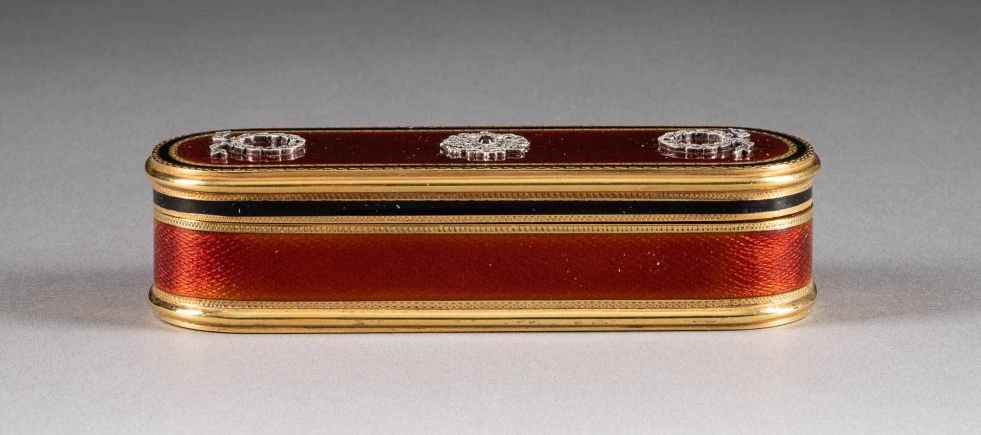 A SILVER-GILT AND GUILLOCHÉ ENAMEL BOX<