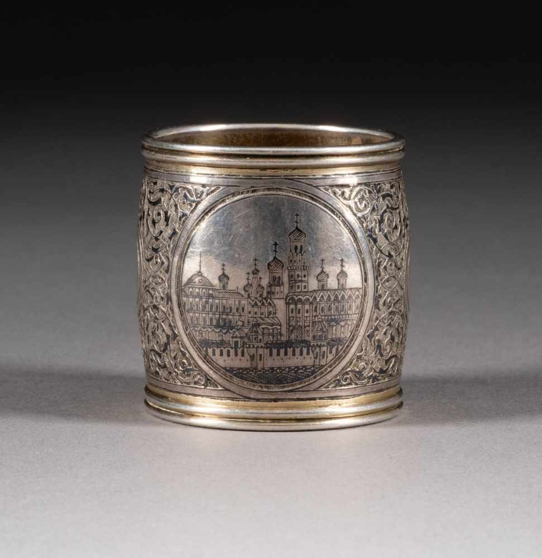 A SILVER AND NIELLO NAPKIN HOLDER WITH ARCHITECTURAL VIEWS OF MOSCOW