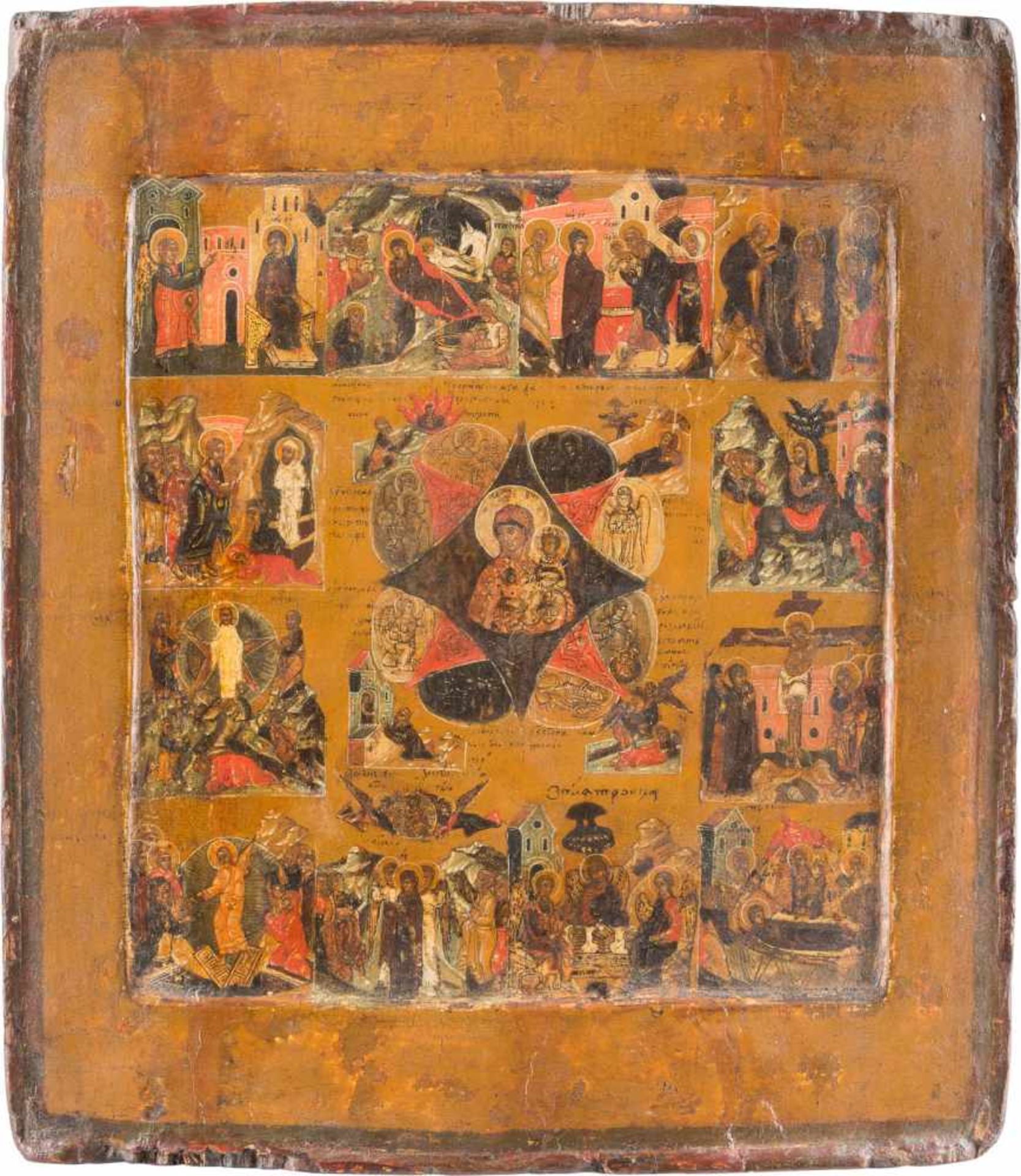 A RARE AND FINE ICON SHOWING THE MOTHER OF GOD 'OF THE BURNING BUSH' AND TWELVE MAJOR