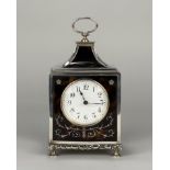 William Comyns silver mounted tortoiseshell carriage/mantel clock, with French wind up movement.