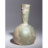 A Roman Glass Bottle Height 8 7/8 inches.