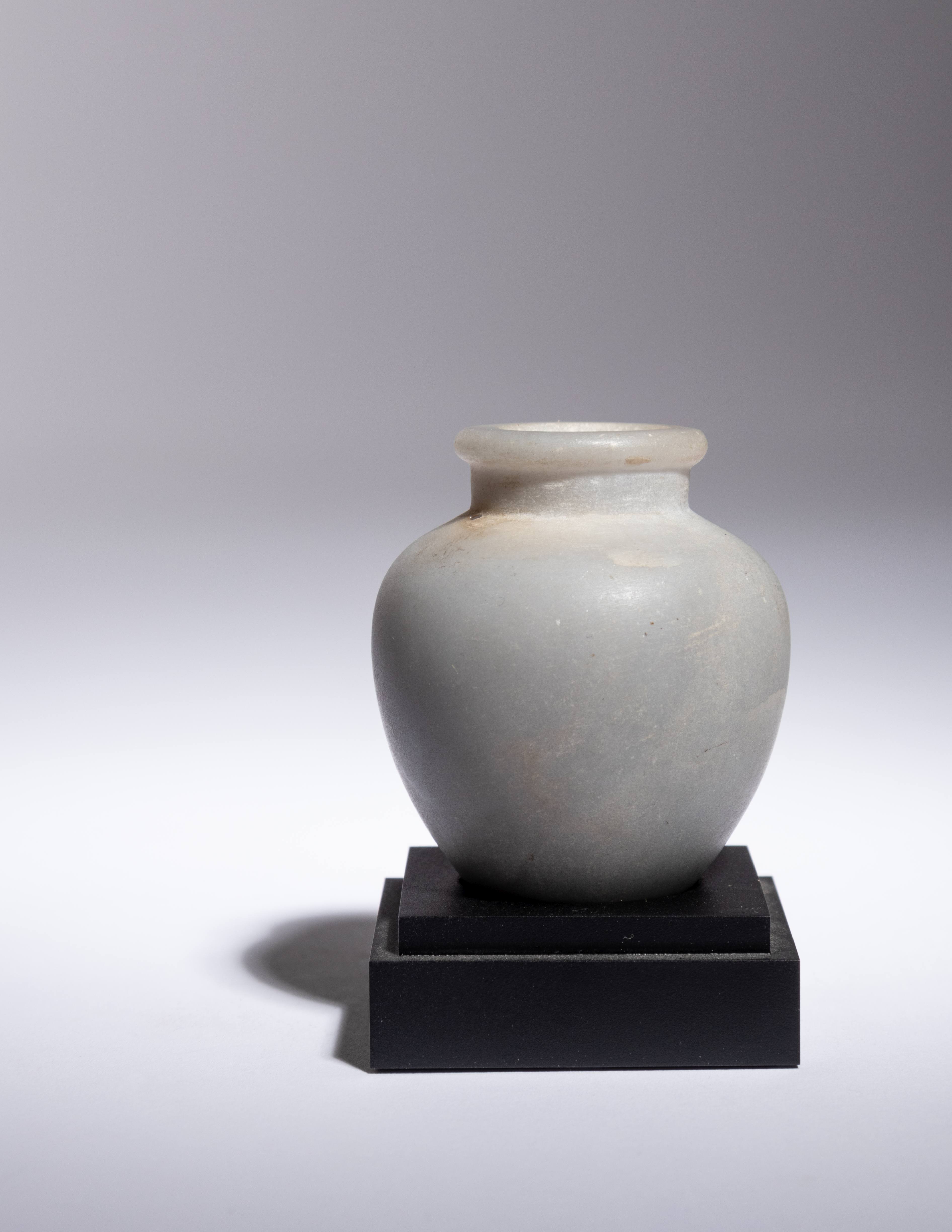 An Egyptian Anhydrite Kohl Pot Height 2 1/4 inches.