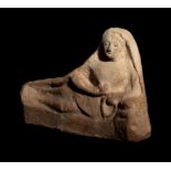 A Greek Terracotta Reclining Figure Height 5 1/2 x