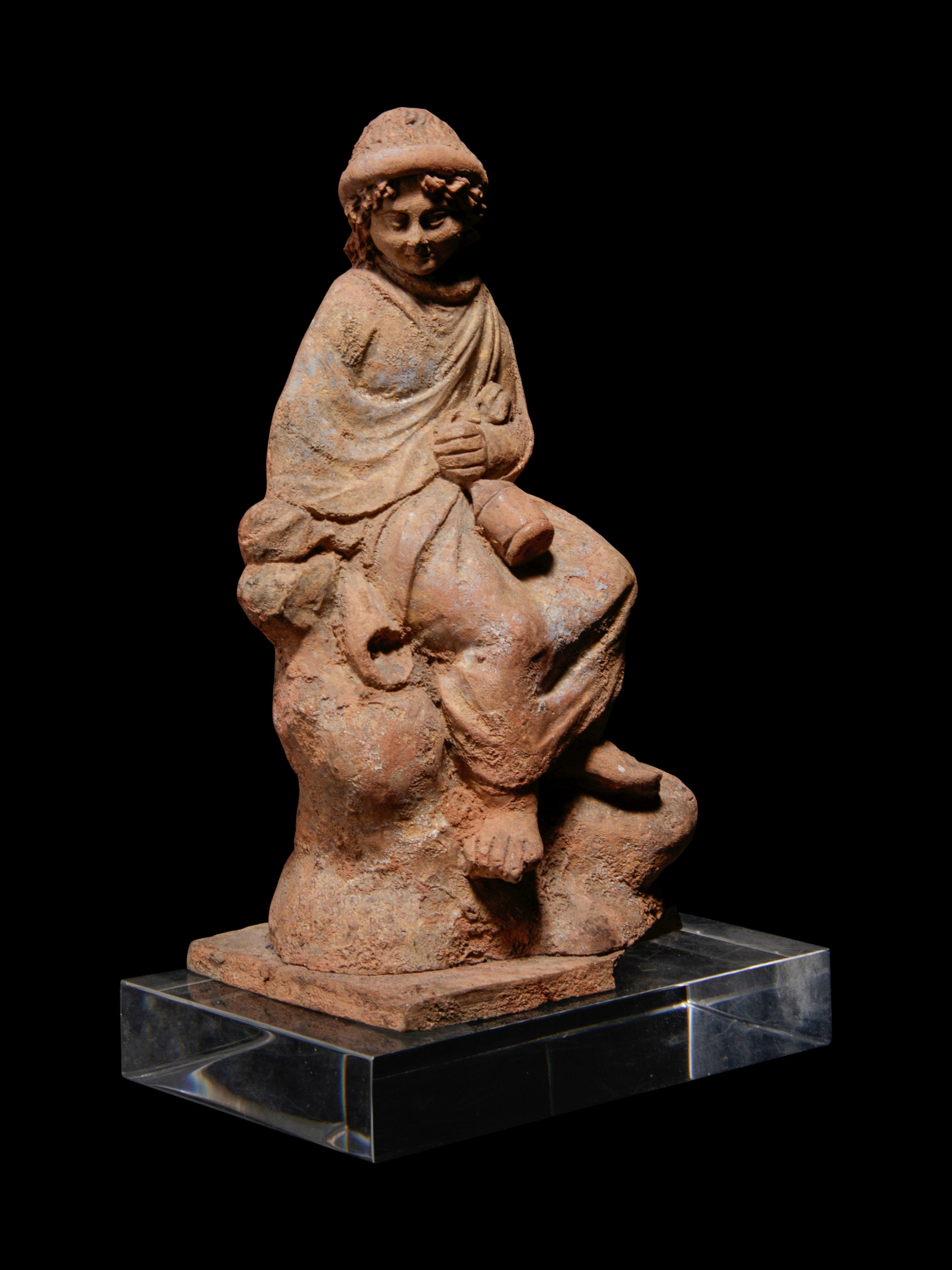 A Greek Terracotta Seated Scholar Holding a Wine Jug - Image 2 of 3