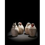 A Set of Four Egyptian Painted Limestone Canopic Jars