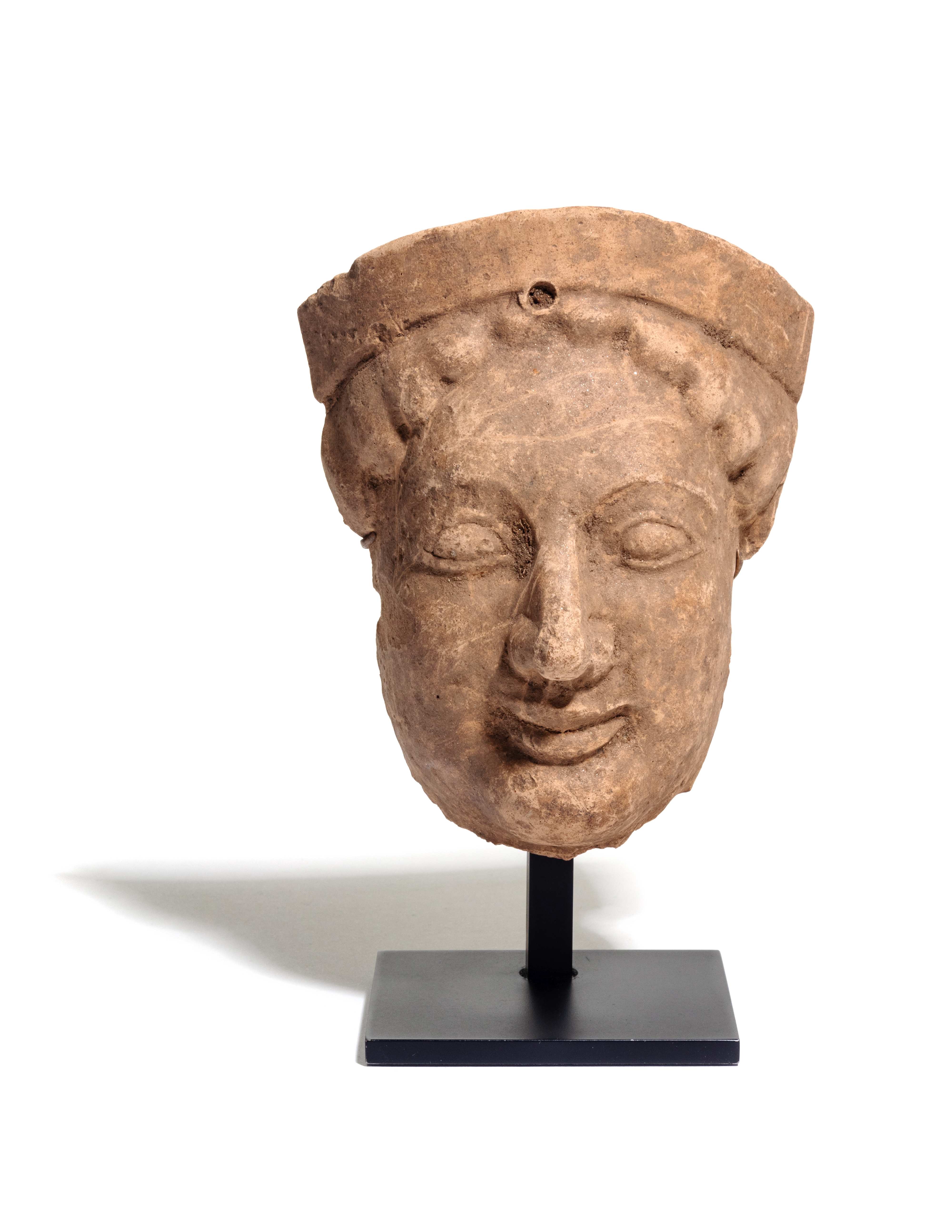 A Greek Terracotta Protome Height 6 1/4 inches.