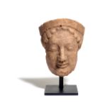 A Greek Terracotta Protome Height 6 1/4 inches.