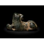 A Greek Bronze Recumbent Lion Length 7/8 inches.