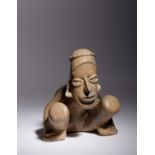 A Jalisco Pottery Crouching Figure Height 6 5/8 x width
