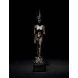 An Egyptian Bronze Striding Neith Height 5 7/8 inches.