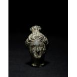 A Roman Bronze Head of a Goddess or Noblewoman Height 1