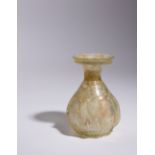 A Roman Glass Flask Height 5 3/8 inches.
