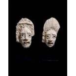 Two Palmyrene Stucco Masks Height of each 6 inches.