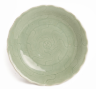 AN INCISED CELADON DISH