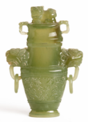 A TWIN HANDLED JADE VASE AND COVER